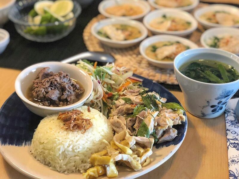 Hoi An chicken rice is cooked in chicken broth and served with shredded chicken